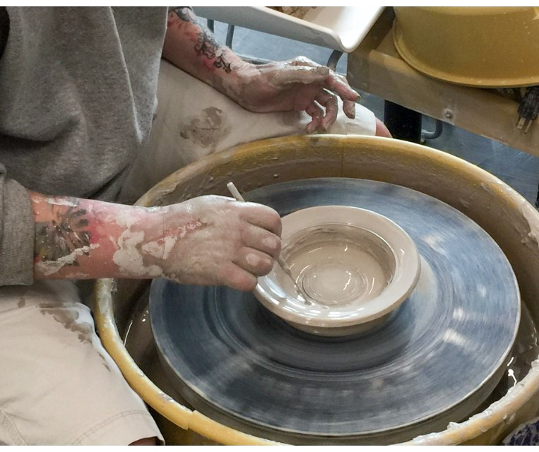Patient Throwing Pottery