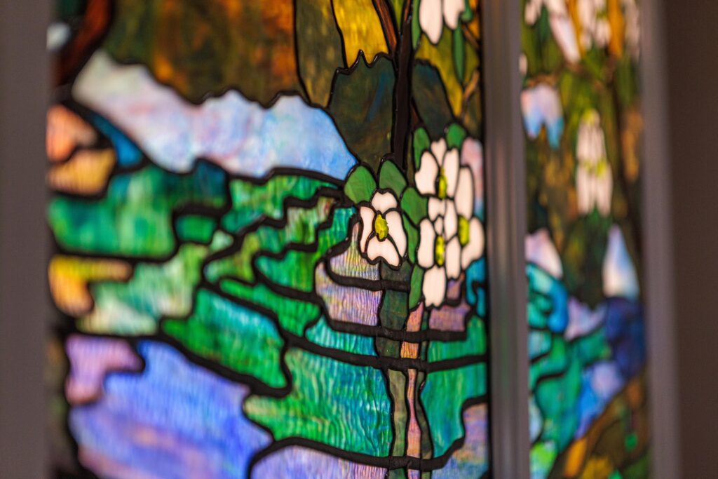 Close up view of the details on the stained glass wall at the First Commerce Center for Compassionate Care