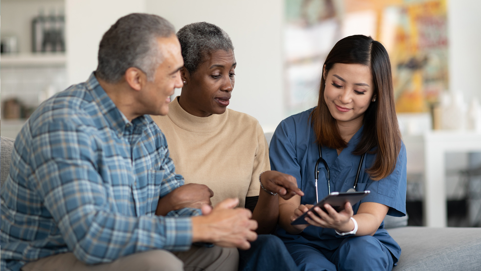 CNA holding hand of patient